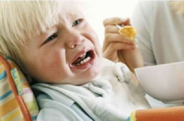 Baby cries while eating